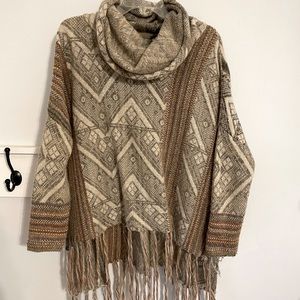 Free people fringe sweater! Super flattering, cute, and warm!
